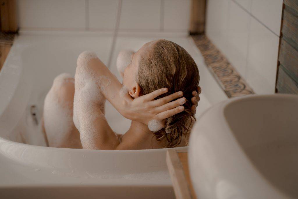 Spy camera filming girl in bath